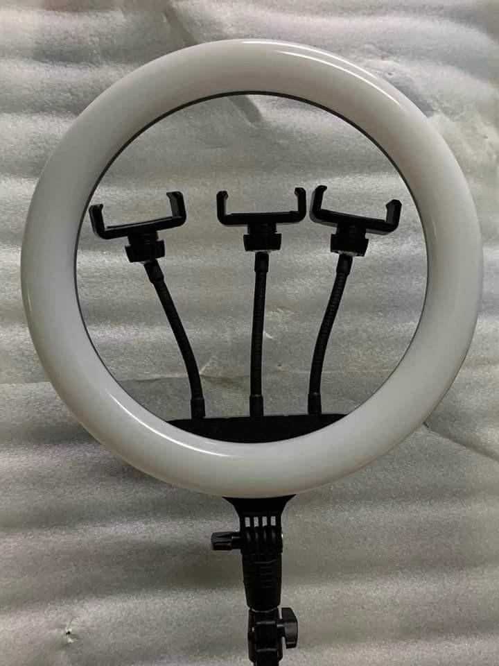 36cm bulb type Ringlight PREMIUM set with Stand (Category: Lighting & Studio Equipment) located in Pasig City. Submitted by gemma_00 (Listing ID 1155543447, Image 1). Description: 36cm Bulb type ringlight PREMIUM Set with stand -with 3 cp holder -with dimmer switch -adjustable color temperature -stand up to 6ft Onhand ❤️ ❗₱1,500 💥Cash on Delivery within Metro Manila and Nearby Areas with Shipping fee.