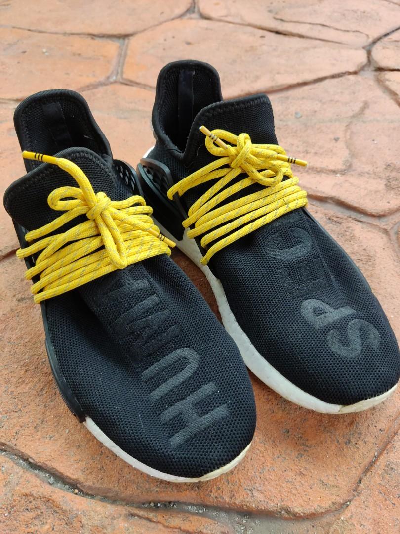Human race black with yellow laces clearance