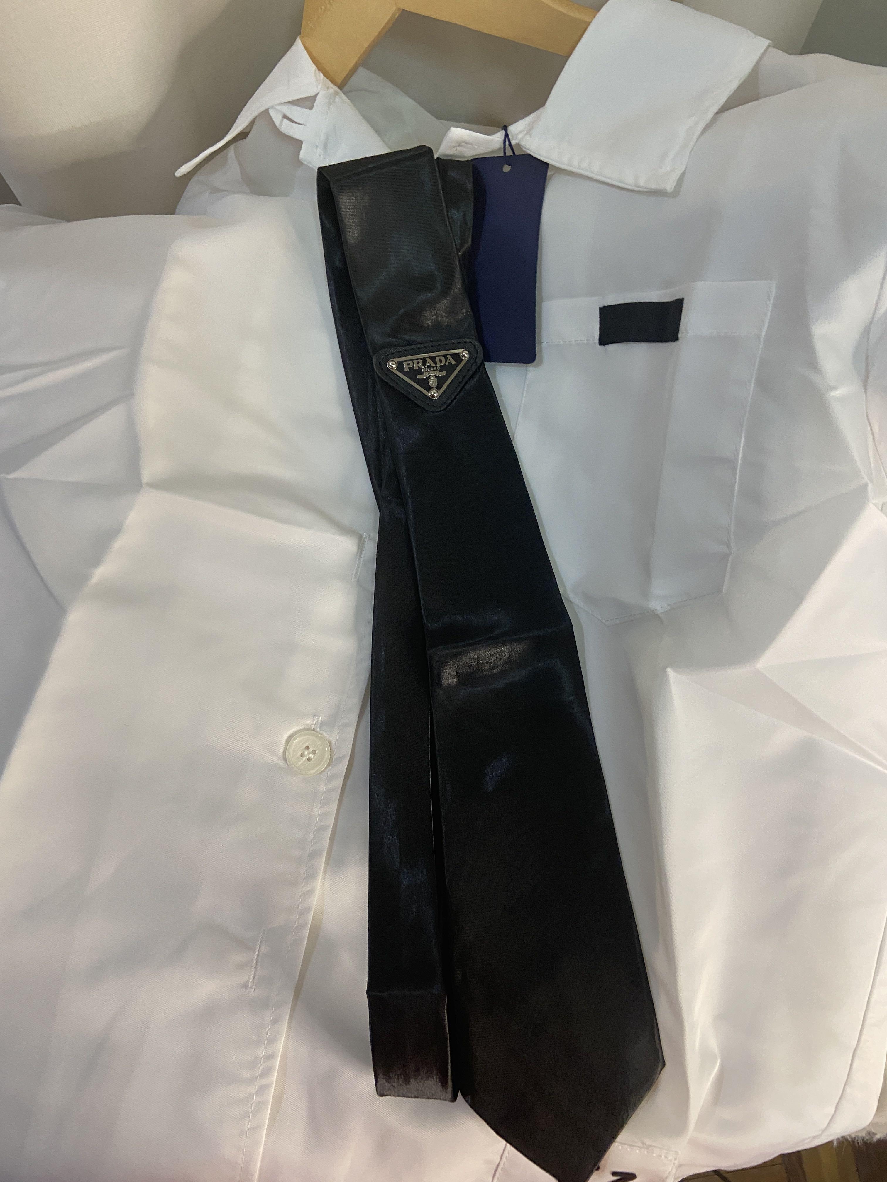 Prada black tie pre order (Category: Ties) located in Mandaluyong City. Submitted by japanandsingaporeluxepreloved (Listing ID 1155542134, Image 2). Description: .