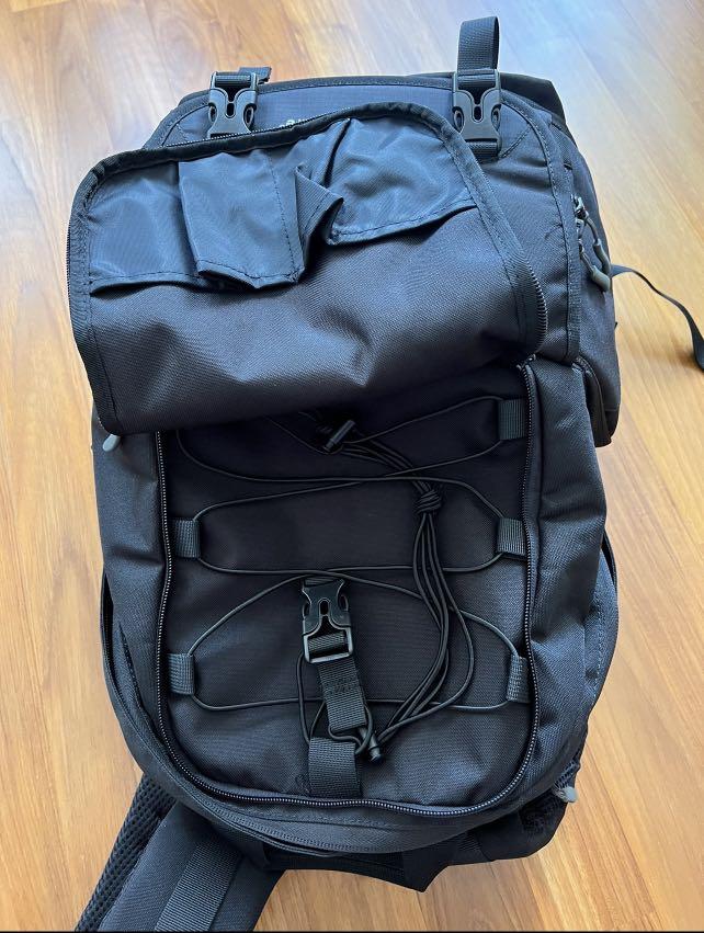 Backpack with outlet side access
