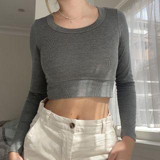 grey long sleeve top with cutout