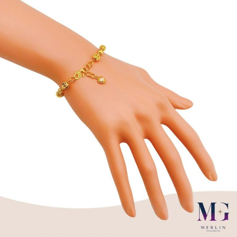 Gold hand bracelet for ladies on sale
