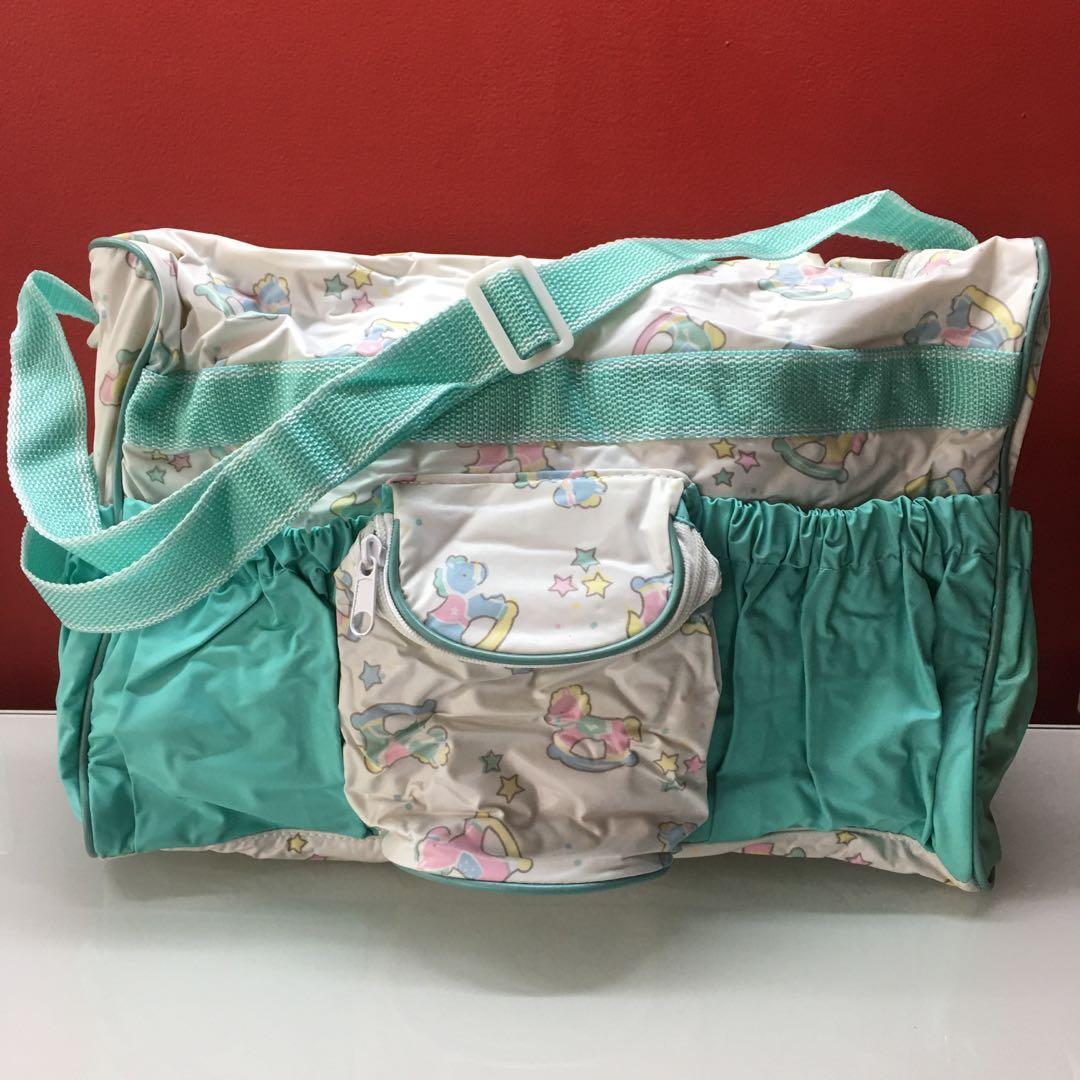 Baby Diaper Bag (Category: Diaper Bags & Wetbags) located in Manila. Submitted by coolandchic (Listing ID 1155982629, Image 1). Description: New Comes with changing mat Water repellent Has pockets for bottles and diapers .