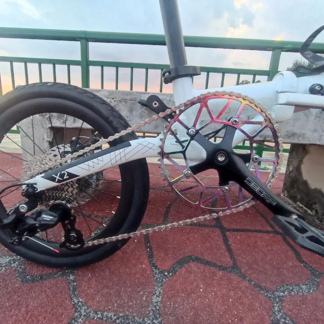 Java X2 9spd foldable bicycle (Category: Bicycles) located in Singapore. Submitted by chewkenneth (Listing ID 1156010052, Image 3). Description: Java X2 foldable bicycle Like new condition 9 speed, 1-by drive train 16-inch wheels Mechanical disc brakes Modified with 54T Litepro multicolour chain ring Well greased and lubed Installed with Rockbros MTB pedals Minus bottle cage and lights Reason for selling: Too many bikes at home, no space to keep.