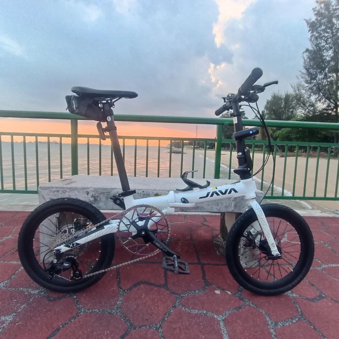 Java X2 9spd foldable bicycle (Category: Bicycles) located in Singapore. Submitted by chewkenneth (Listing ID 1156010052, Image 1). Description: Java X2 foldable bicycle Like new condition 9 speed, 1-by drive train 16-inch wheels Mechanical disc brakes Modified with 54T Litepro multicolour chain ring Well greased and lubed Installed with Rockbros MTB pedals Minus bottle cage and lights Reason for selling: Too many bikes at home, no space to keep.