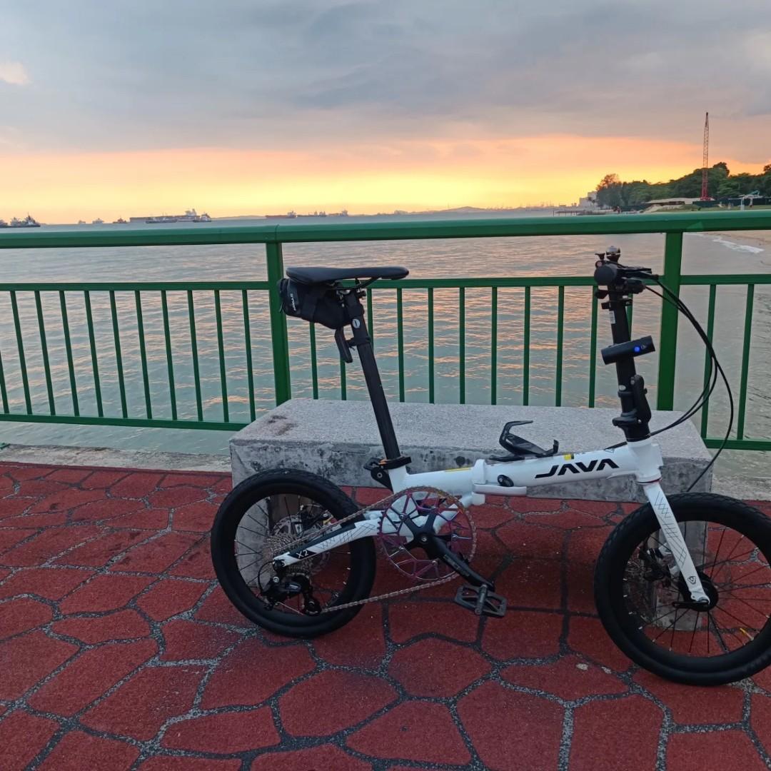 Java X2 9spd foldable bicycle (Category: Bicycles) located in Singapore. Submitted by chewkenneth (Listing ID 1156010052, Image 4). Description: Java X2 foldable bicycle Like new condition 9 speed, 1-by drive train 16-inch wheels Mechanical disc brakes Modified with 54T Litepro multicolour chain ring Well greased and lubed Installed with Rockbros MTB pedals Minus bottle cage and lights Reason for selling: Too many bikes at home, no space to keep.