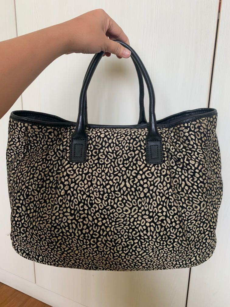 Jim Thompson Bag (Category: Tote Bags) located in Singapore. Submitted by wooboo (Listing ID 1155956428, Image 1). Description: Big and roomy, great for everyday use. Bought from flagship Jim Thompson store in Bangkok. Trimming on the handles has partially flaked. .