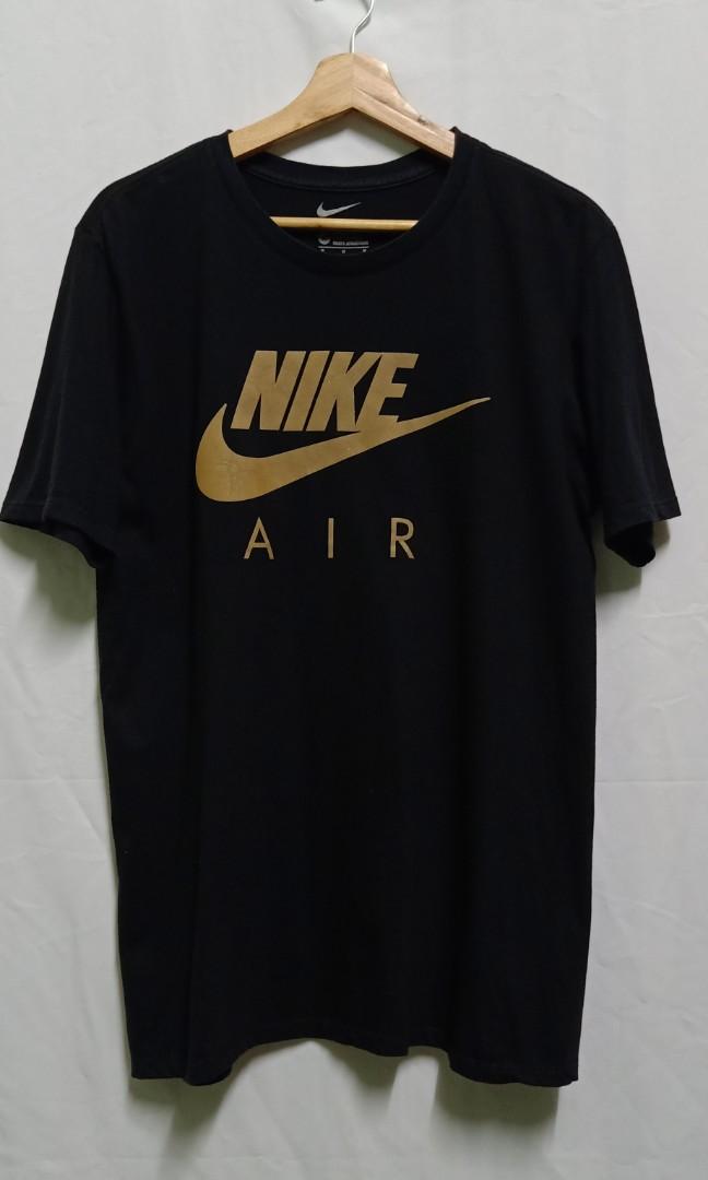 Black nike shirt with gold swoosh deals