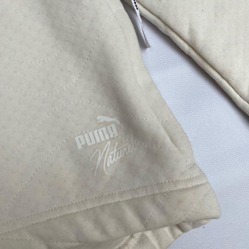 Puma x naturel track top store