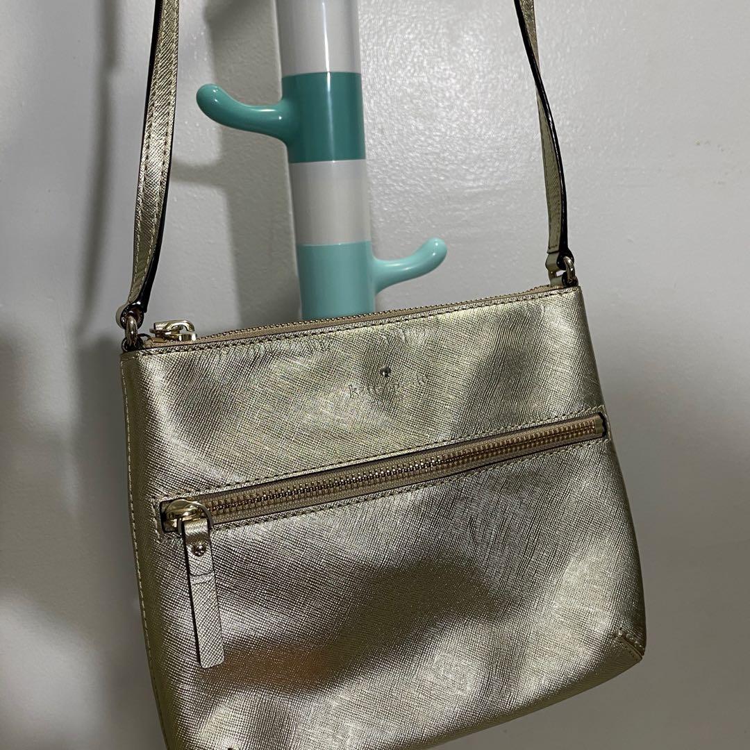 Kate spade gold sling bag (Category: Cross-body Bags) located in Taguig. Submitted by kkstuff_ (Listing ID 1152661477, Image 2). Description: 🌷Rules: READ •First to comment mine •Payment First Policy •Fixed Price •Strictly 2 days reservation only •Scheduled Delivery, NO RUSH 🌷Brand & Details on picture 🌷Color may vary due to lighting.