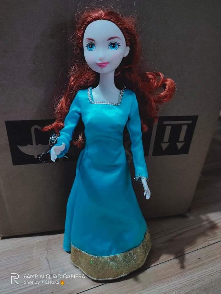 Merida of Brave (Category: Figurines & Statues) located in Paranaque City. Submitted by athenaseducationalbook (Listing ID 1152555540, Image 1). Description: walang articulation may konting flaw yung left side ng dress sa bandang kamay pero di nakaaffect sa quality ng doll maganda padin 350 BDO/GCASH/PALAWAN SHOPEE COD/JNT/MCFA.