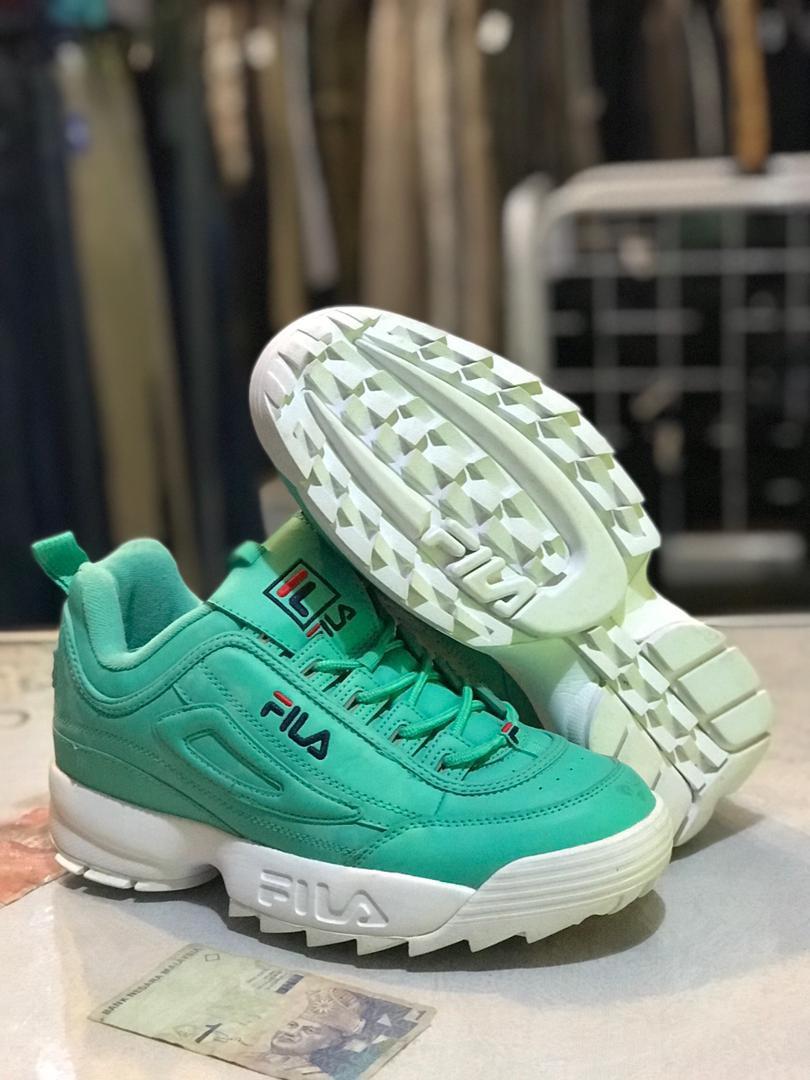 Mint green fila shoes sale