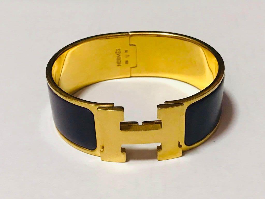 Hermes H bangle black wide (Category: Luxury Accessories) located in Cagayan de Oro. Submitted by moiobsession (Listing ID 1156338356, Image 1). Description: Authentic H wide Fits small to medium wrist Black enamel Gold hardware.