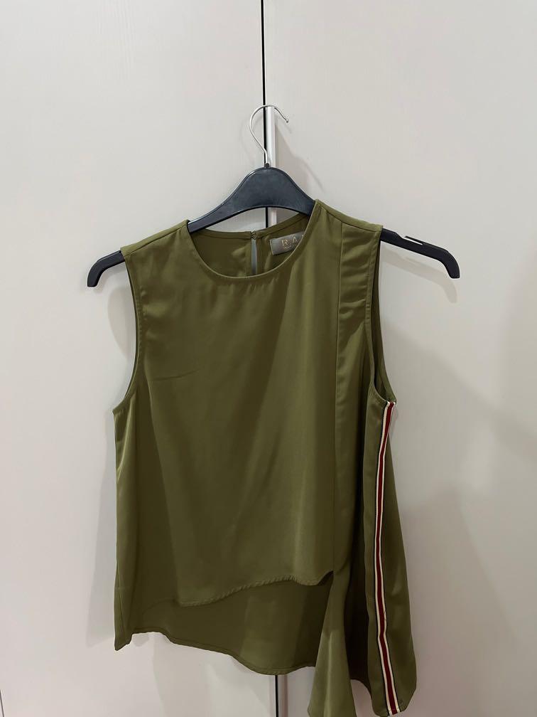 RAF Plains and Prints Multi Layer Olive Blouse (Category: Blouses) located in Quezon City. Submitted by hellocaitlin (Listing ID 1156327322, Image 1). Description: - worn once, has very light stain at the bottom but not noticeable (see last photo) Loc: Quezon City MOP: gcash/shopee checkout MOD: grab/lalamove (METRO MANILA) or shopee checkout .