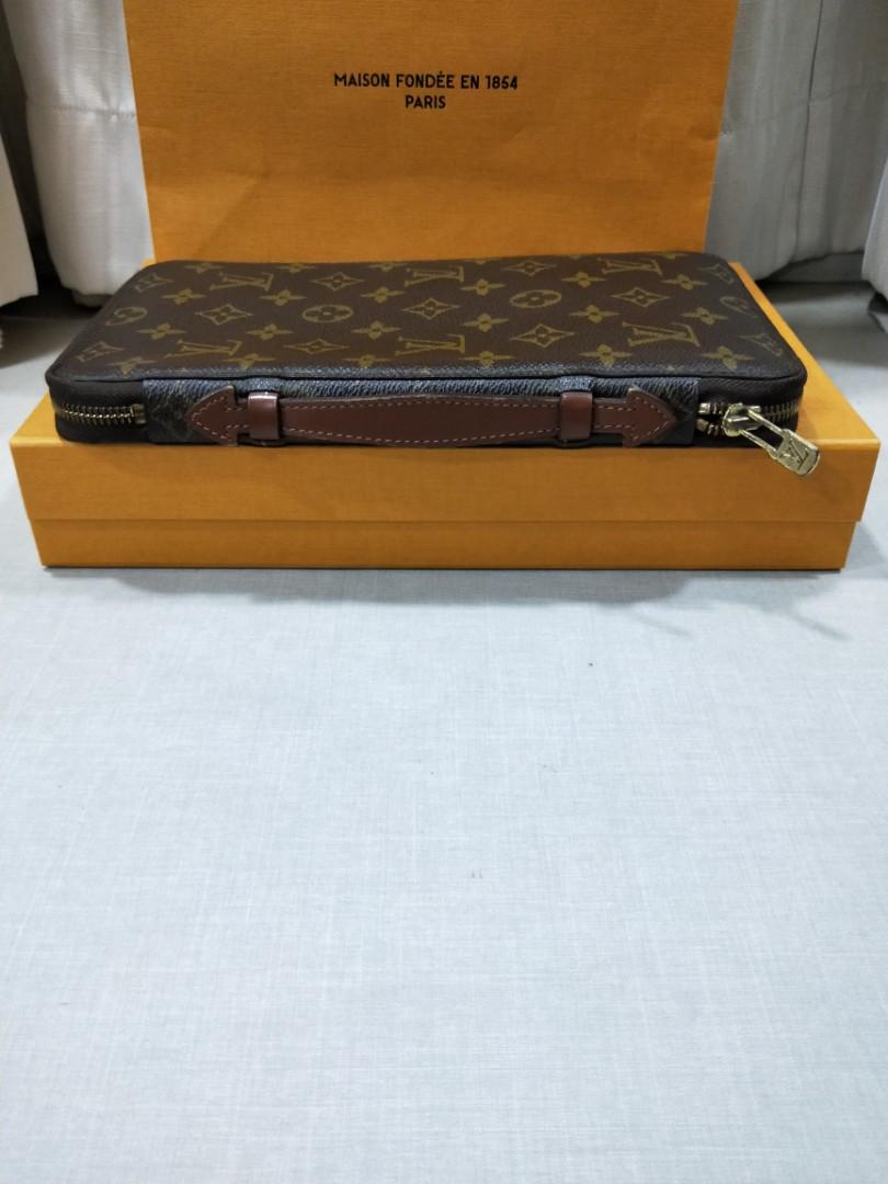 Vintage Authentic Louis Vuitton Poche Escapade Organizer Travel Wallet,  Luxury, Bags & Wallets on Carousell