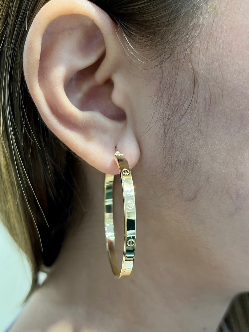 Gold hoop sale earrings cartier