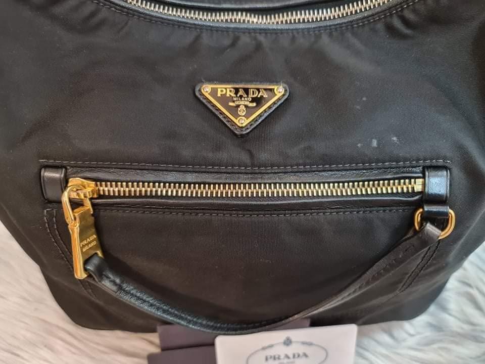 💯original Prada tessuto-nappa (Category: Luxury Bags & Wallets) located in Las Pinas. Submitted by ipsfontillas (Listing ID 1156409080, Image 2). Description: Original💯 TESSUTO-NAPPA Top Handle Bag Good Condition Signs of use please see detailed photos 15000php.