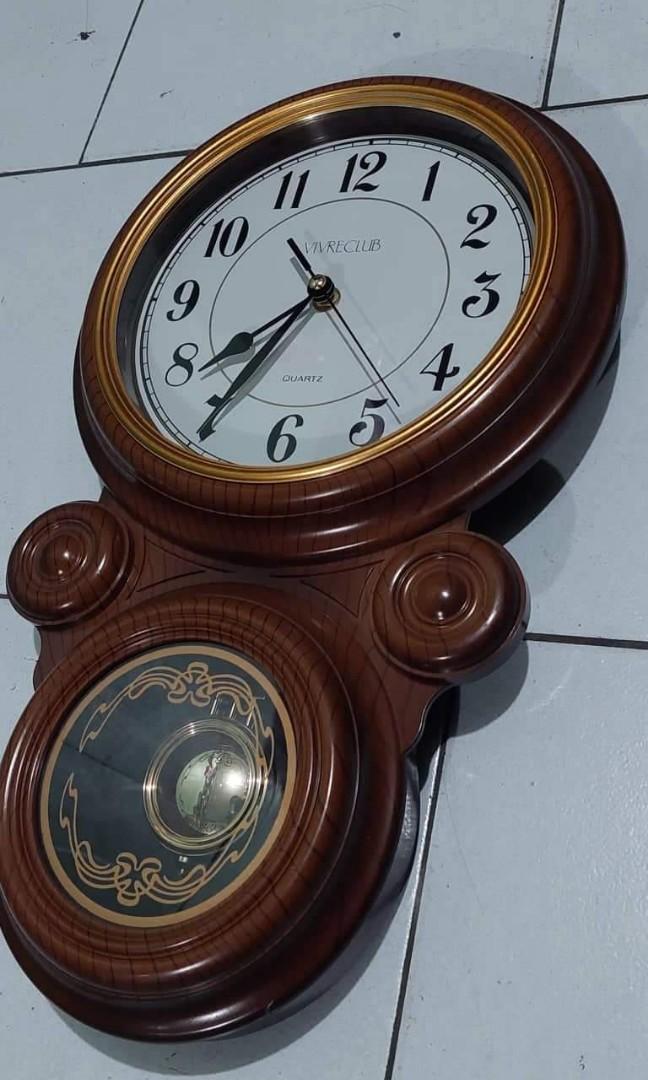 Pendulum wall clock (Category: Clocks) located in Caloocan City. Submitted by great_2003 (Listing ID 1156456191, Image 1). Description: good running condition brand new condition swinging pendulum used 4 pcs double battery chime every hour battery not included tested elegant classic look plastic case material as is only wysiwyg.