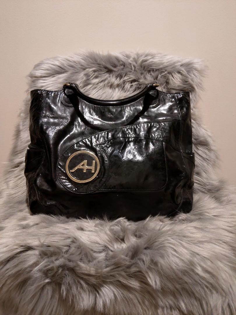 Anya Hindmarch Bag (Category: Luxury Bags & Wallets) located in Marikina City. Submitted by noblecat_40a38b (Listing ID 1156542741, Image 1). Description: Ana Hindrich London Patent Leather Black Decluttering Storage smell needs usage Free SF within NCR.