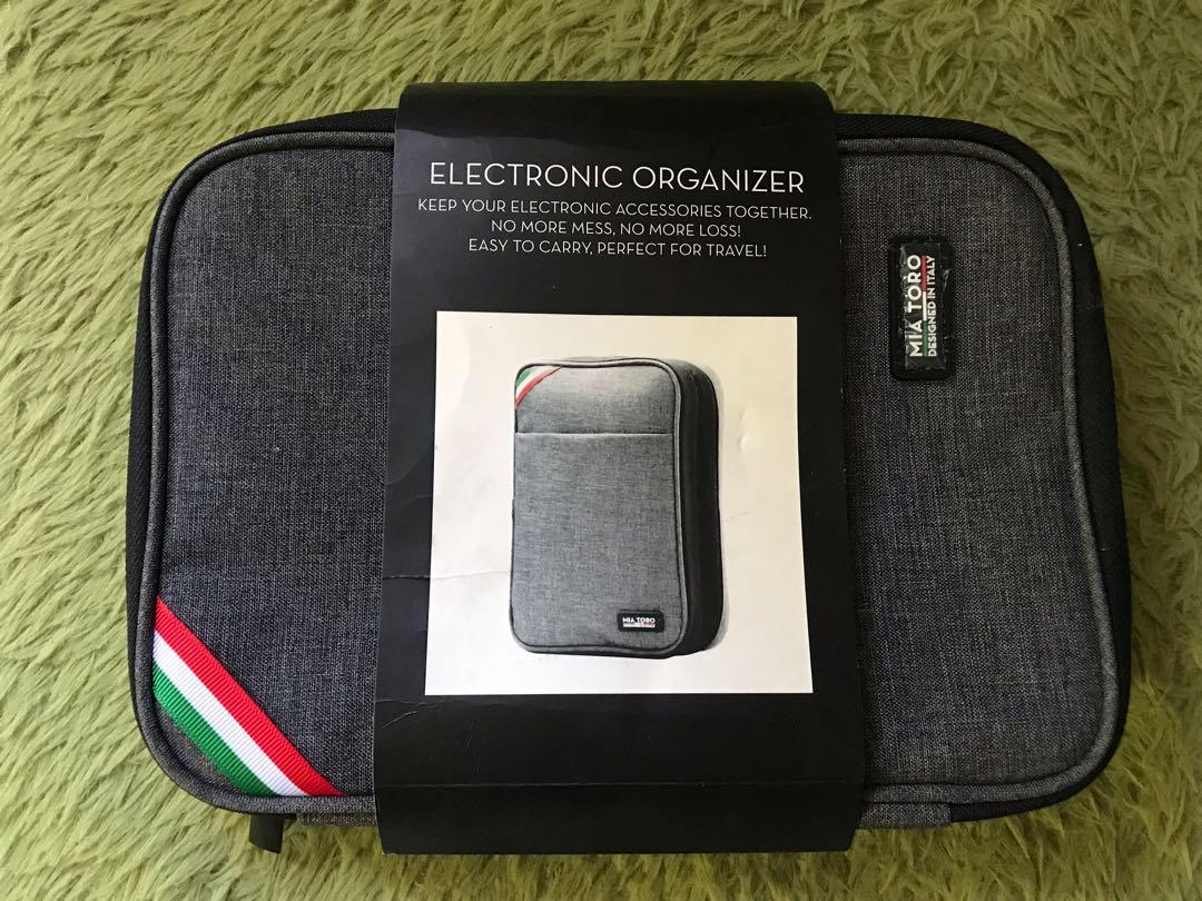 Electronic Organizer/ Pouch Made in Italy (Category: Accessory Holder, Box & Organizers) located in Bambang. Submitted by mythriftstyle (Listing ID 1156574762, Image 1). Description: • Brandnew • Very spacious • Perfect for Travel • Sold in cheaper price compared to SRP (1,500php) ** Last 2 photos for reference only.