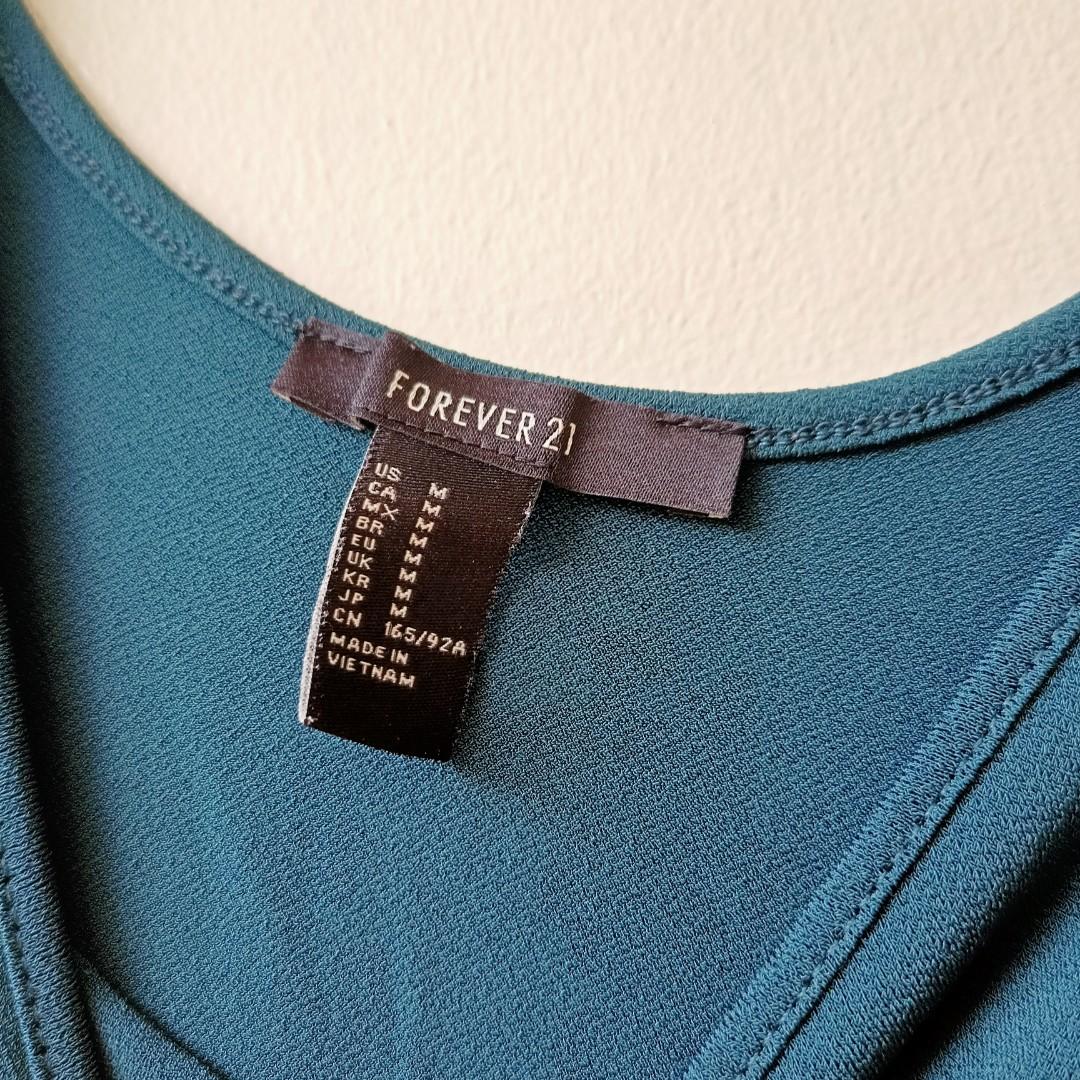 Forever 21 bodysuit (Category: Others Tops) located in Mandaluyong City. Submitted by declutter21m (Listing ID 1156577412, Image 2). Description: don't hesitate to make an offer! :D fits small-medium rfs: decluttering.