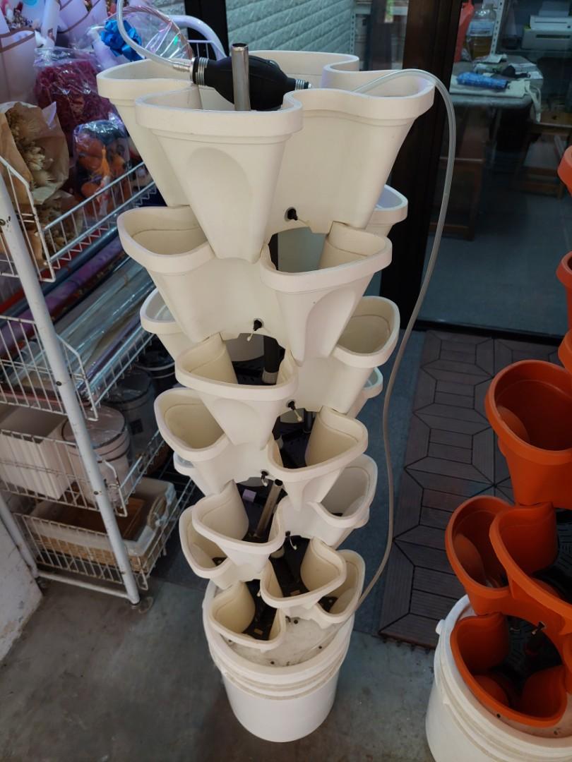 Stackable Potting Self watering stackable potting system for edible plants and gardening ...