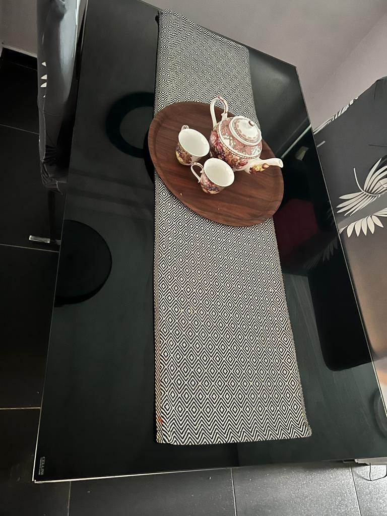 Dining sets (Category: Tables & Sets) located in Singapore. Submitted by mohdfai (Listing ID 1156732592, Image 3). Description: Cellini tampered glass dining table top with stainless steel frames/base, the table top has some hairline scratches.. dimensions: L140 cm x W 80 cm x H 74 cm 4 nos of chairs. Not for fussy buyers but overall the set has a very stylish and elegant look. Please arrange for your own transport, the the tampered glass top can