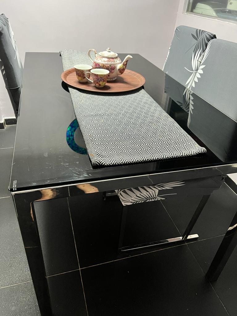 Dining sets (Category: Tables & Sets) located in Singapore. Submitted by mohdfai (Listing ID 1156732592, Image 1). Description: Cellini tampered glass dining table top with stainless steel frames/base, the table top has some hairline scratches.. dimensions: L140 cm x W 80 cm x H 74 cm 4 nos of chairs. Not for fussy buyers but overall the set has a very stylish and elegant look. Please arrange for your own transport, the the tampered glass top can