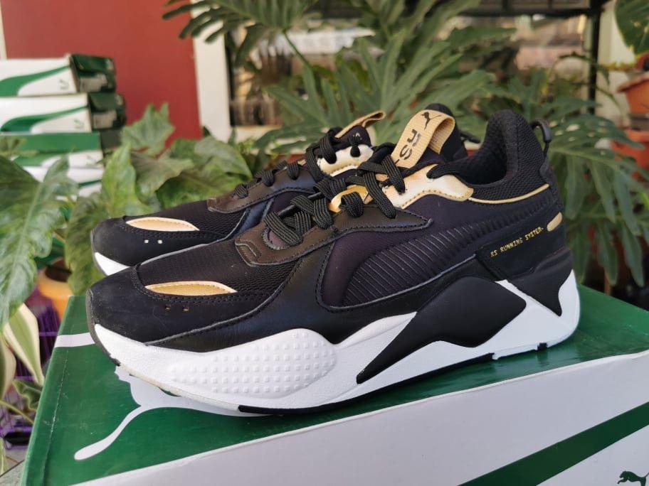 Puma rsx hot sale trophy black gold