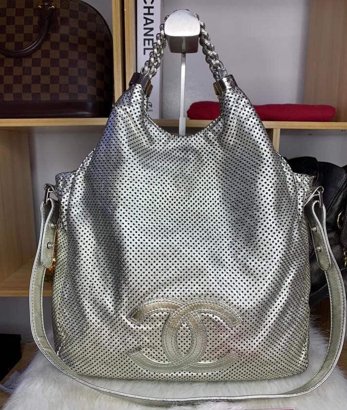 Authentic Chanel Mettalic Perforated Calfskin Rodeo Drive Tote, Luxury, Bags  & Wallets on Carousell