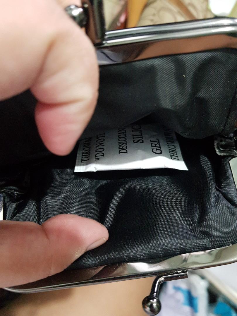 Black Coin Purse (Category: Luxury Bags & Wallets) located in Pasig City. Submitted by loveanca (Listing ID 1157008249, Image 3). Description: original price: 400 selling it for only 250. not used..