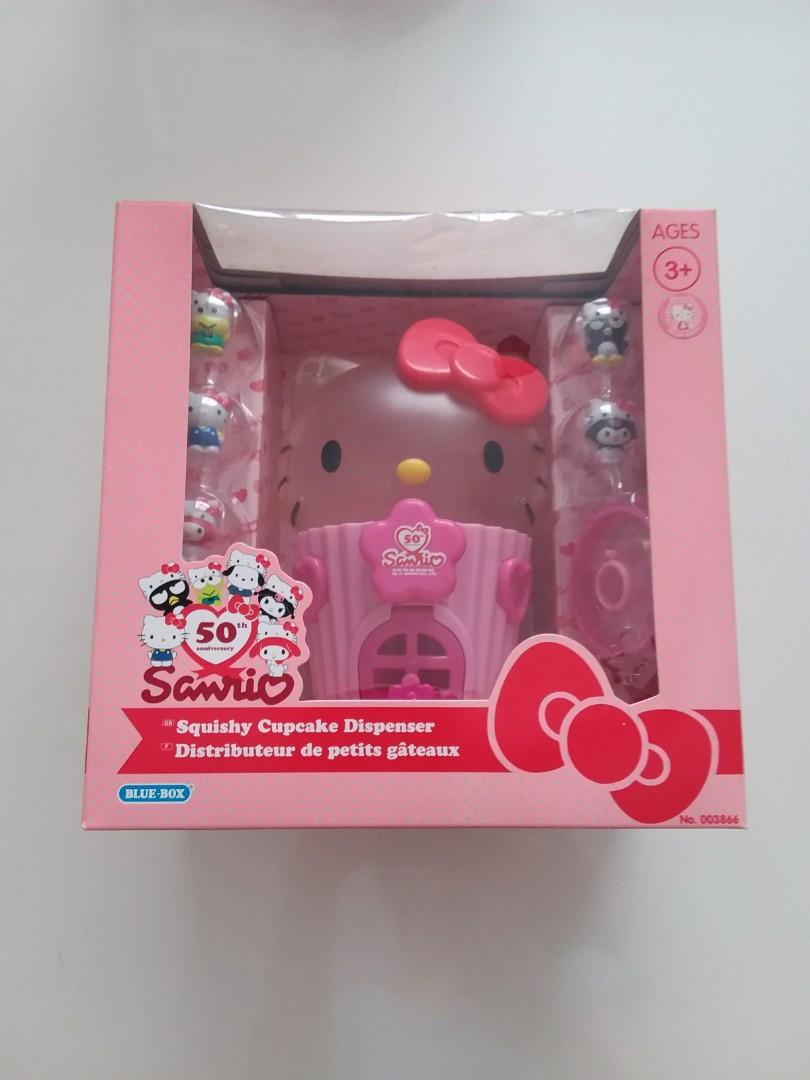Bnib RARE hello kitty squishy cupcake dispenser/piggy bank, Hobbies