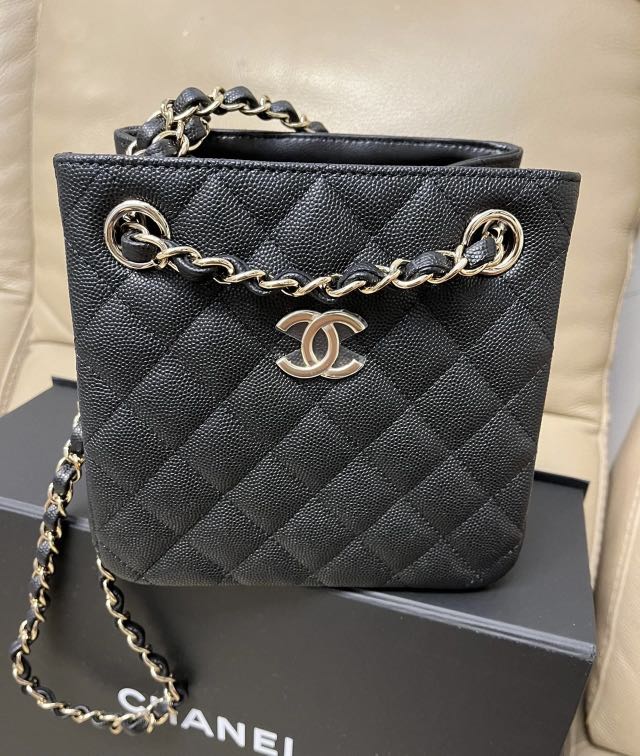 Chanel 22S mini bucket bag in black Caviar in LGHW, Luxury, Bags