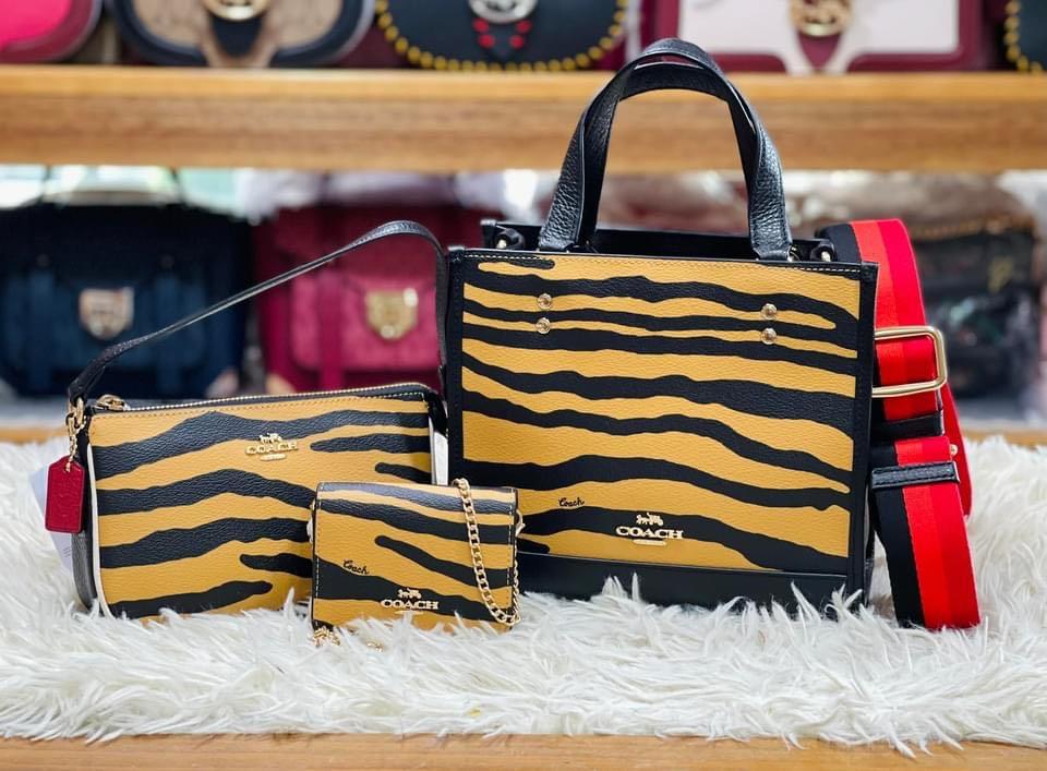 Coach Tiger Print Bags (Category: Luxury Bags & Wallets) located in Pasay City. Submitted by sassyshoppermnl (Listing ID 1157064094, Image 1). Description: .