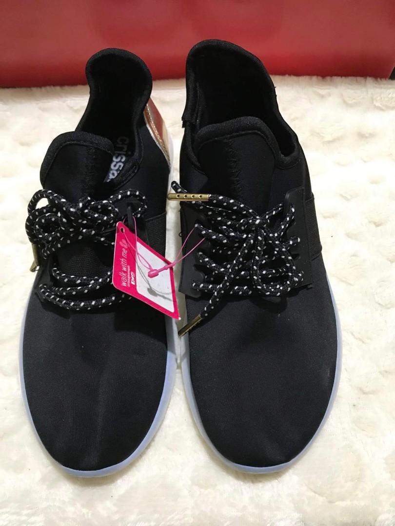 Crissa Ladies Black Shoes (Category: Sneakers) located in Manila. Submitted by RCiey (Listing ID 1156961285, Image 1). Description: Crissa shoes Mall pull out Brand new condition, minimal damage No box included Size EU 38 Color may vary due to lighting.