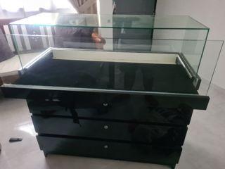Glass display cabinet with drawer
