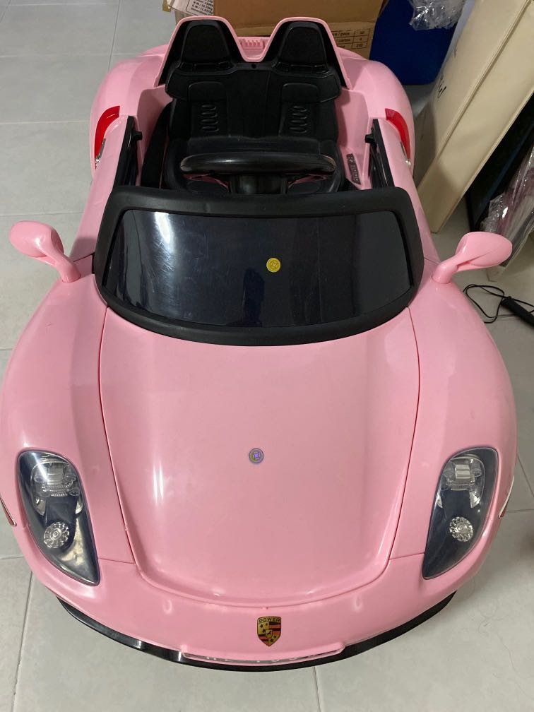Pink porsche online ride on car