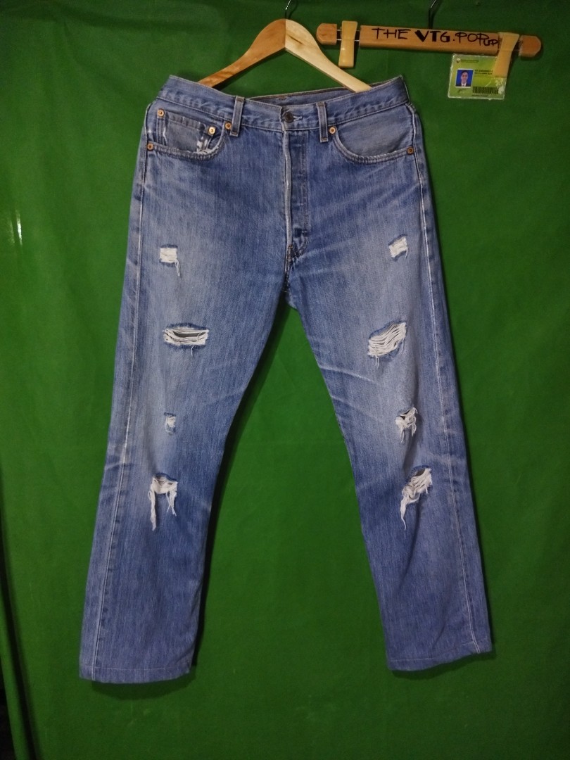 Levi's 501 ripped jeans, Men's Fashion, Bottoms, Jeans on Carousell