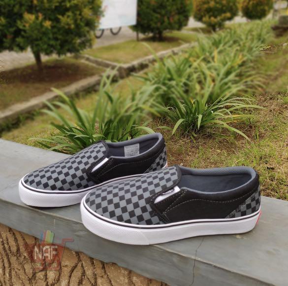 All over checkerboard slip on vans sales