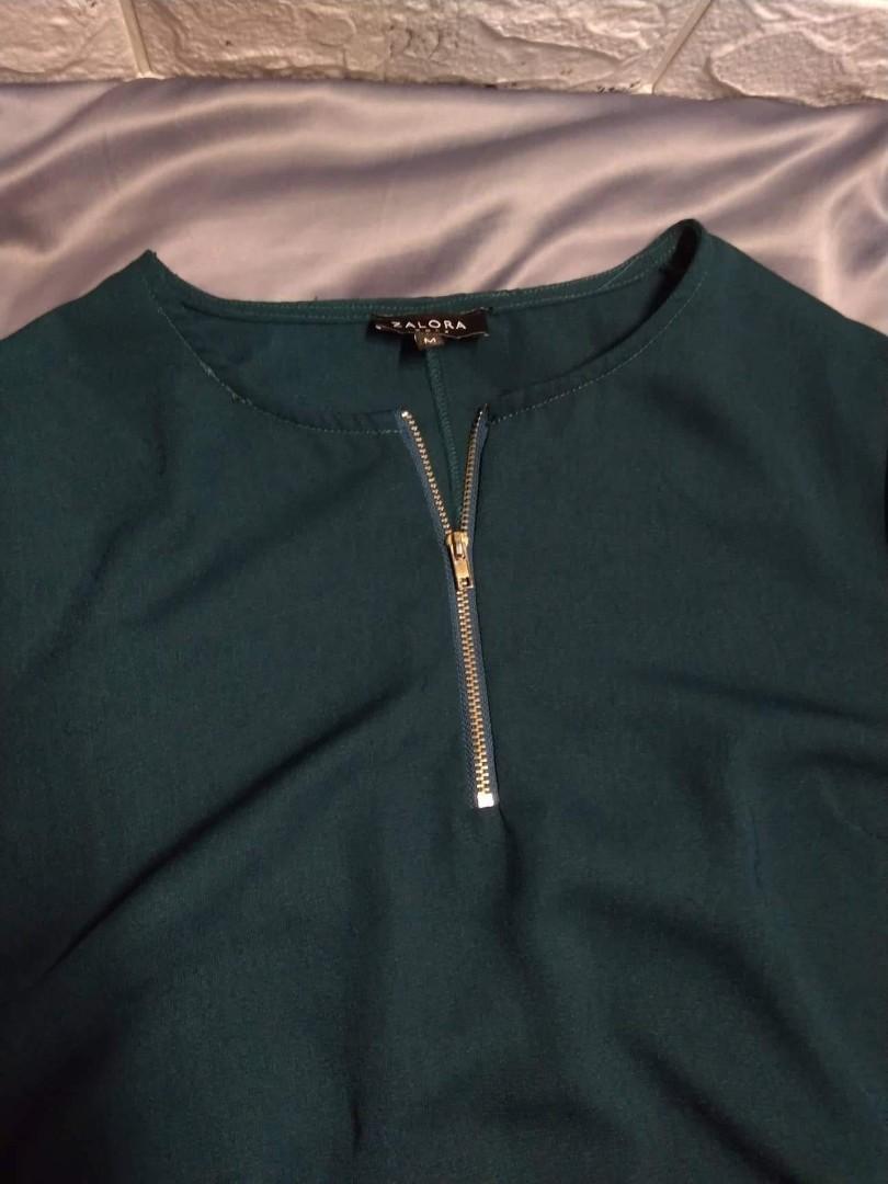 Zalora longsleeve zipper detail (Category: Longsleeves) located in Makati City. Submitted by so.manythings (Listing ID 1157005183, Image 2). Description: Dark green color Chest- 36'' Length- 27''.