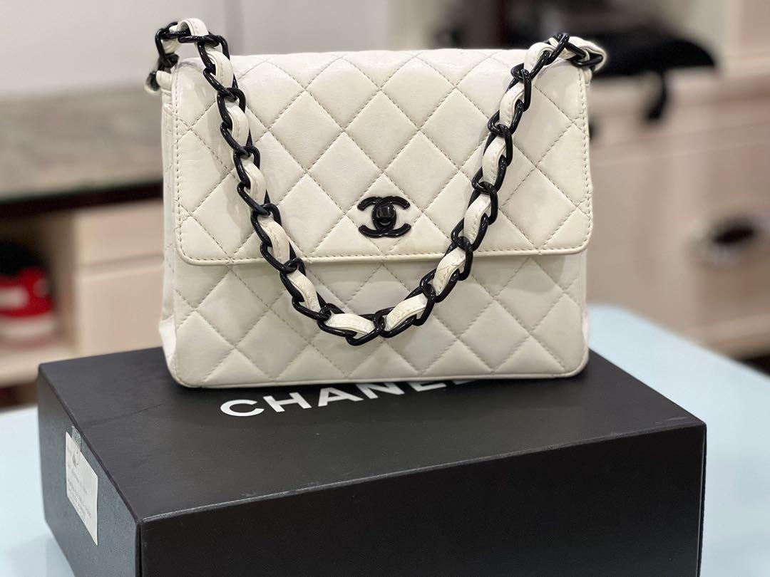 Authentic Chanel white lambskin black hardwares flap bag, Luxury