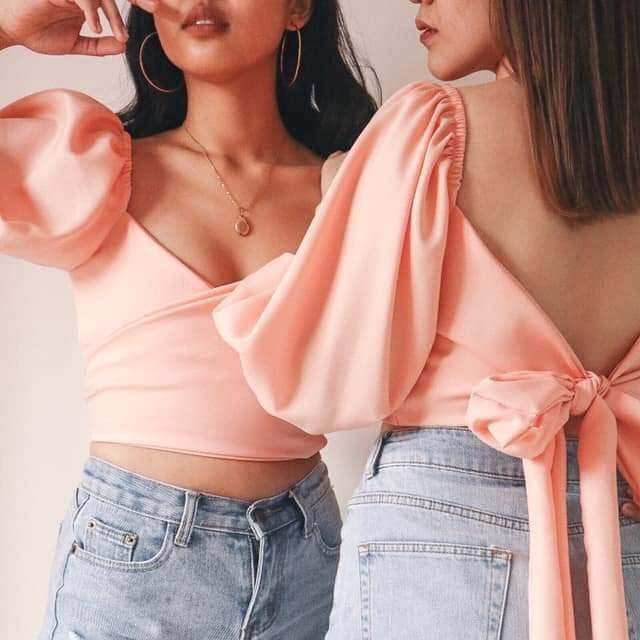 Blush Pink 2-Way Wrap Top (Category: Blouses) located in Las Pinas. Submitted by theseventhph (Listing ID 1157151744, Image 1). Description: 2-way wrap top (blush pink) Size: Medium Best fits semi-medium frames and small boobs lol Never worn No flaws RFS: This was a gift, and it doesn't fit me. *Worn photo is from the brand.