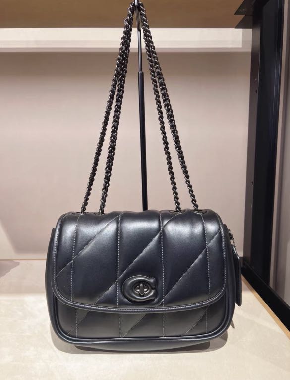 Matte black coach purse sales