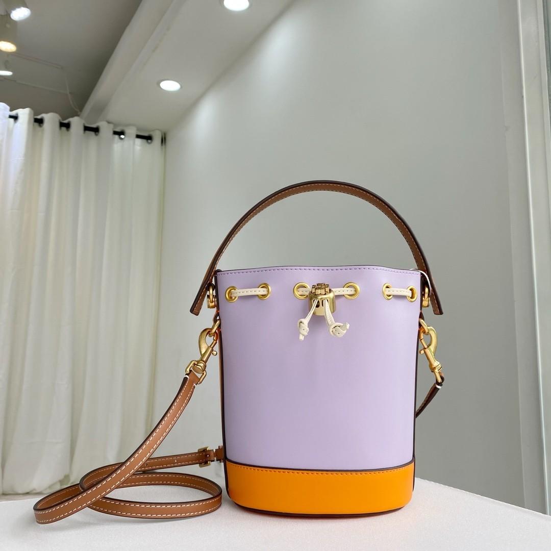 Tory Burch Colour Mixed Bucket Bag with Crossbody Strap, Women's Fashion,  Bags & Wallets, Cross-body Bags on Carousell