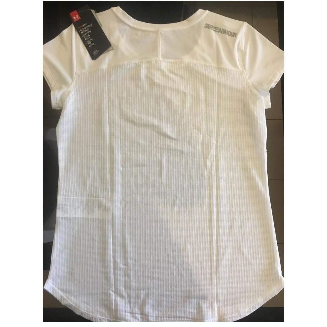 Under Armour Womens White Shirt (Category: Shirts) located in Paranaque City. Submitted by gavinledesma (Listing ID 1157211844, Image 3). Description: Under Armour Ladies White Shirt Size - Small Condition - Brand new with the tags still attached. Not even fitted. For 1700 only. Retail is 2200. Preferred Payment Mode - Gcash Pick Up Location: BRGY. DON BOSCO, PARANAQUE BUYER to shoulder shipping fee. Please check shipping fee rate via Grab/Lalamo