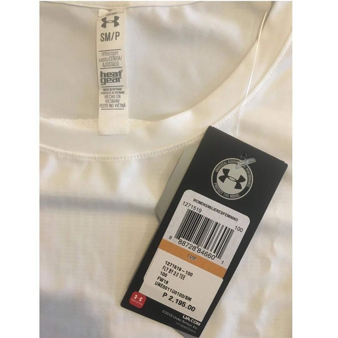 Under Armour Womens White Shirt (Category: Shirts) located in Paranaque City. Submitted by gavinledesma (Listing ID 1157211844, Image 2). Description: Under Armour Ladies White Shirt Size - Small Condition - Brand new with the tags still attached. Not even fitted. For 1700 only. Retail is 2200. Preferred Payment Mode - Gcash Pick Up Location: BRGY. DON BOSCO, PARANAQUE BUYER to shoulder shipping fee. Please check shipping fee rate via Grab/Lalamo