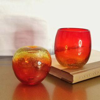 Apple-shaped stemless wine glass and display