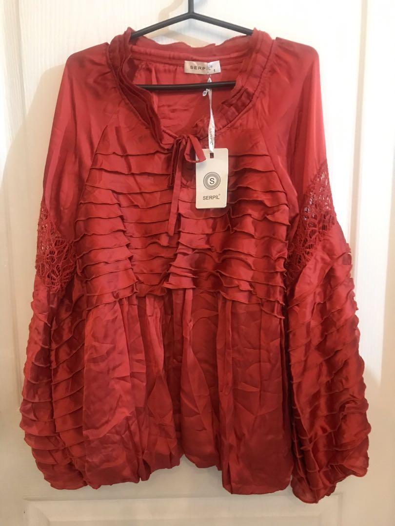 RUST ORANGE RUFFLED TOP (Category: Blouses) located in Capas. Submitted by stuffandgo (Listing ID 1157416179, Image 3). Description: Fits S to M.