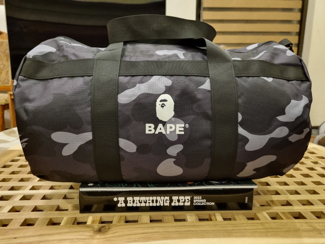 A BATHING APE (BAPE) duffle bag color black camo, Men's Fashion, Bags,  Sling Bags on Carousell