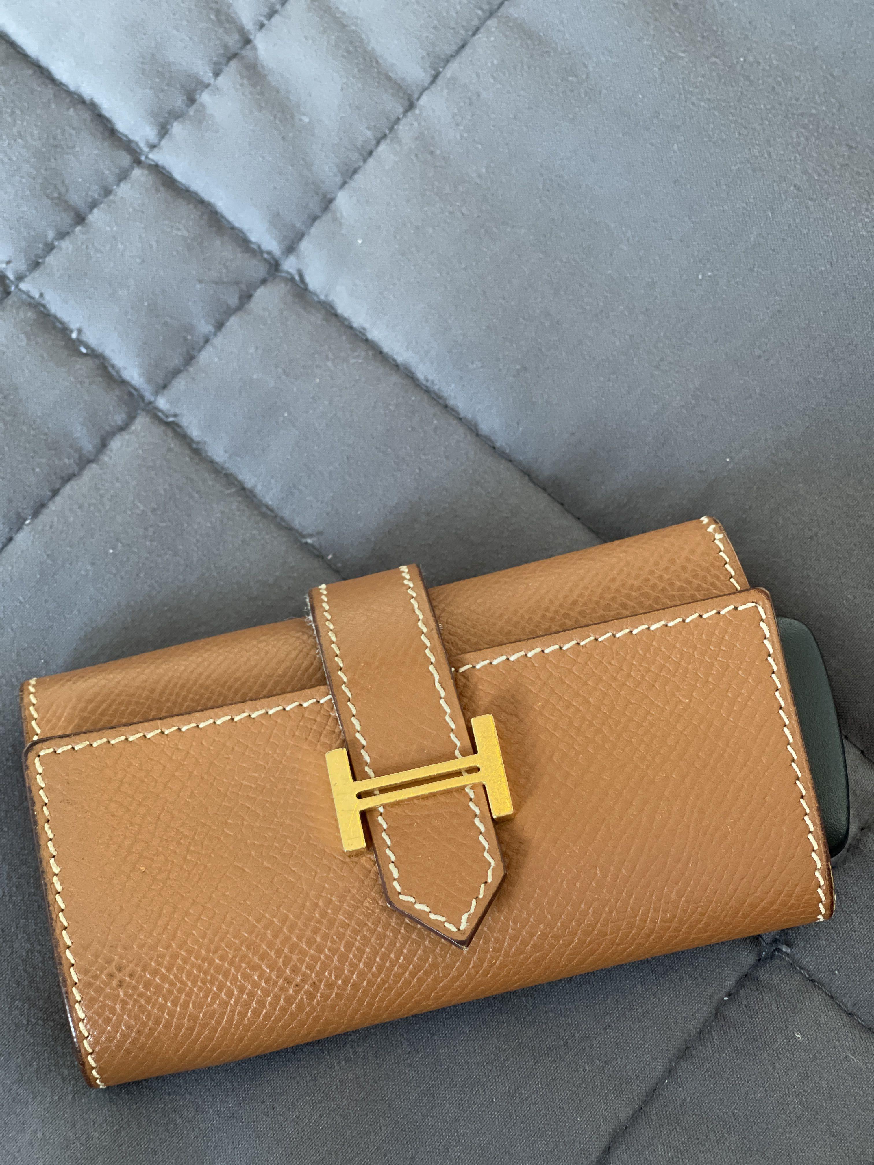 Authentic Hermes Bearn 4 Key Holder Gold (Category: Luxury Bags & Wallets) located in Taguig. Submitted by hellofritzi (Listing ID 1157627261, Image 2). Description: This is one of my Hermes gold collection. Authentic HERMES Bearn Multicles 4 Key Holder in Gold hardware, epsom leather. My absolute favorite ❤️ The flap opens with a leather tab and Hermes H to 4 gold key holders. No issue no problem. Message me. Gold Dogon Small Wallet - Not for sa